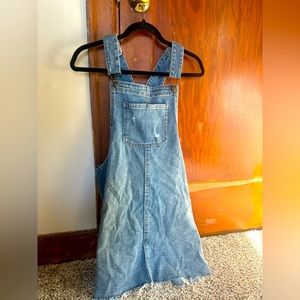 Cute mini denim overall dress! Never worn, bought brand new. Lightly wrinkled.
